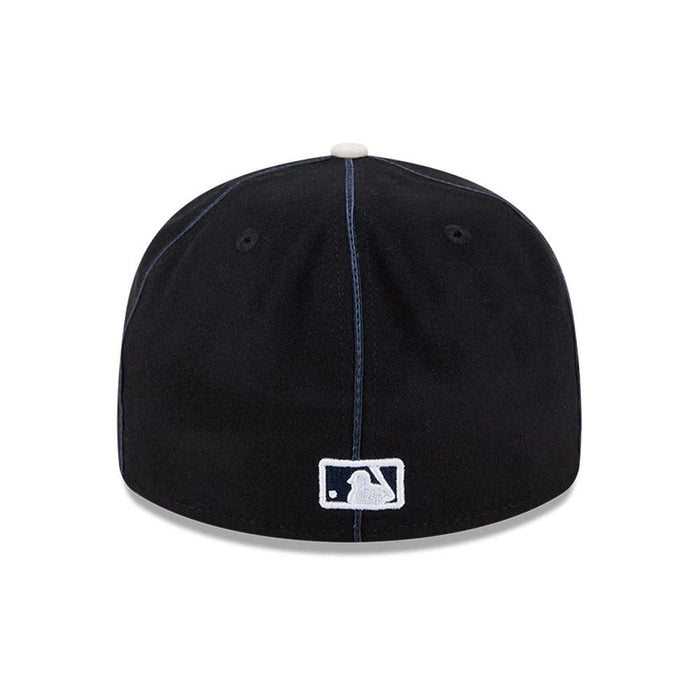 Pictured is this MLB Felt Logo New York Yankees Retro Crown 59FIFTY Fitted cap in navy. 7