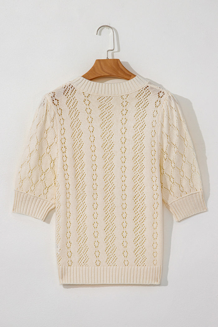 Pull beige à manches courtes bouffantes *
