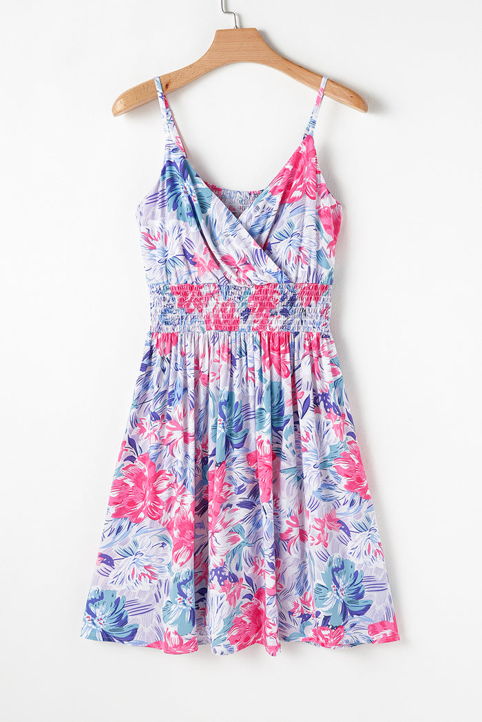 Robe courte à bretelles spaghetti et col surplis à taille froncée à fleurs bleu ciel