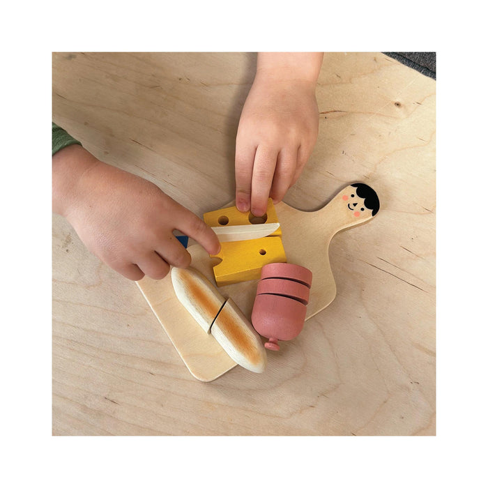 Smiley Charcuterie Chopping Board - in use