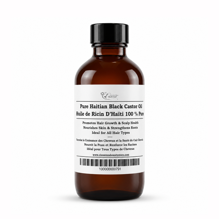 Brown bottle of Pure Haitian Black Castor Oil with a white label on a white background