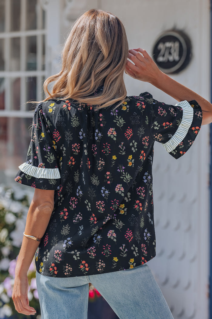 Chemise à fleurs à manches courtes et bordure