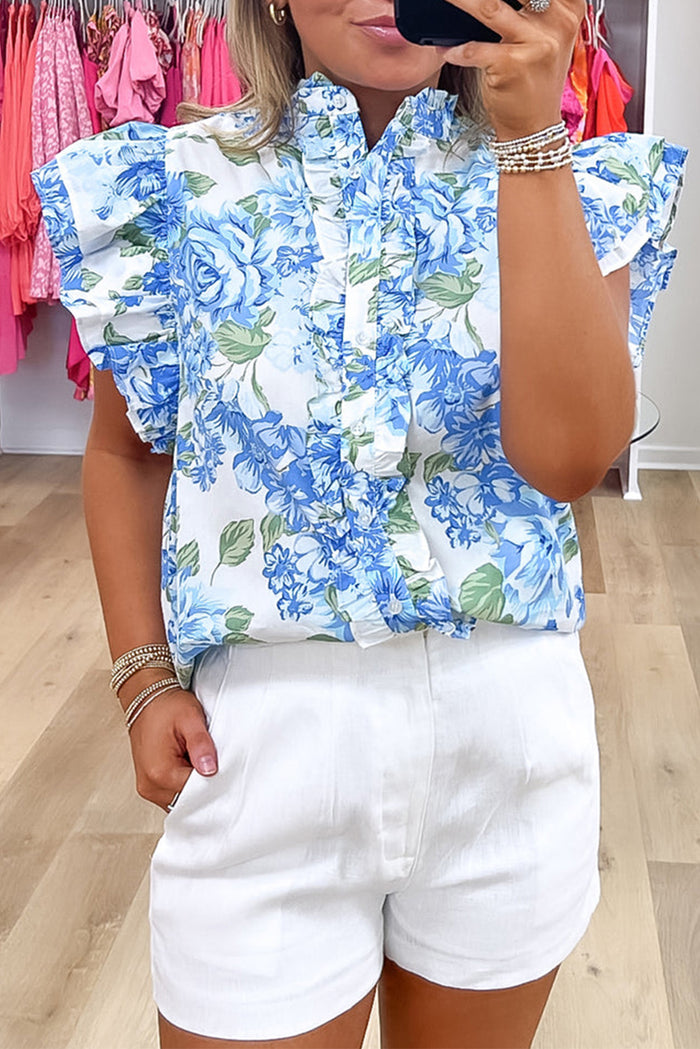Chemise boutonnée à volants et imprimé floral bleu ciel-A WOMAN WE LOVE