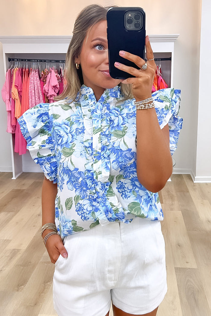 Chemise boutonnée à volants et imprimé floral bleu ciel-A WOMAN WE LOVE