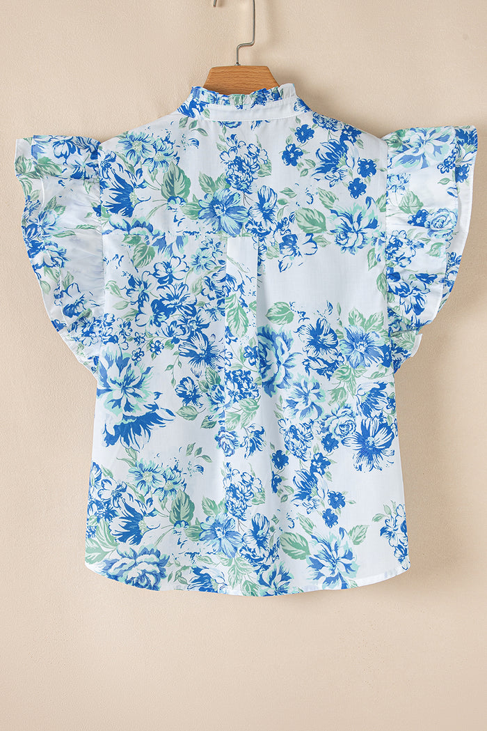 Chemise boutonnée à volants et imprimé floral bleu ciel-A WOMAN WE LOVE