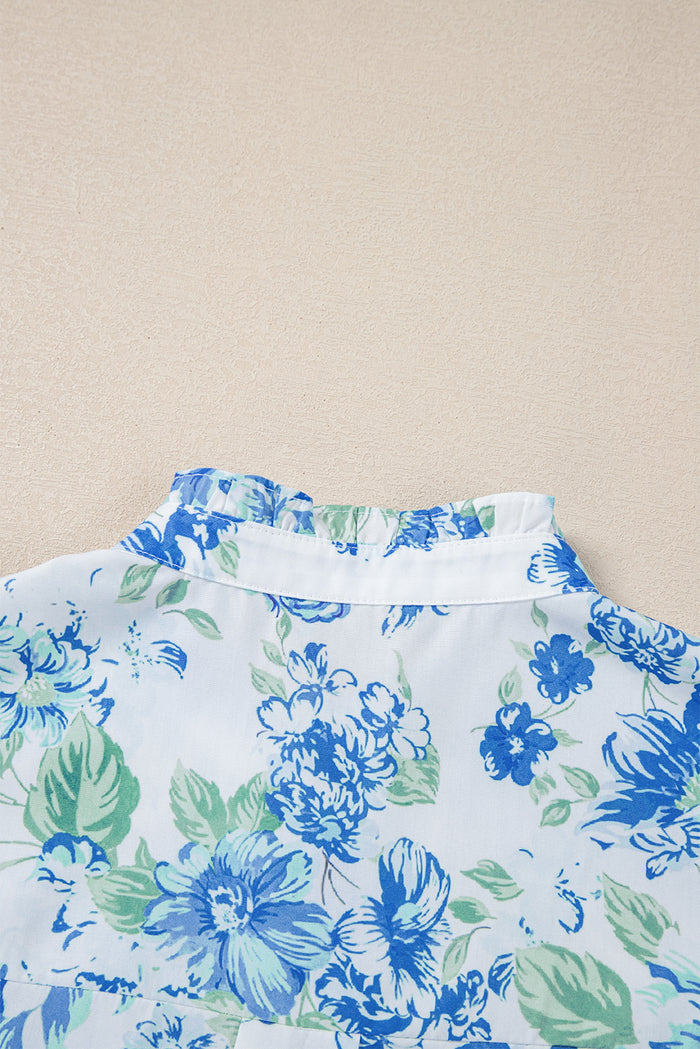 Chemise boutonnée à volants et imprimé floral bleu ciel-A WOMAN WE LOVE