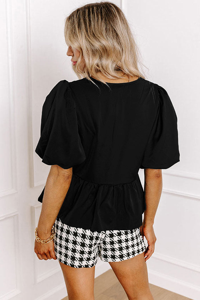 Chemise péplum noire à manches bouffantes *-A WOMAN WE LOVE