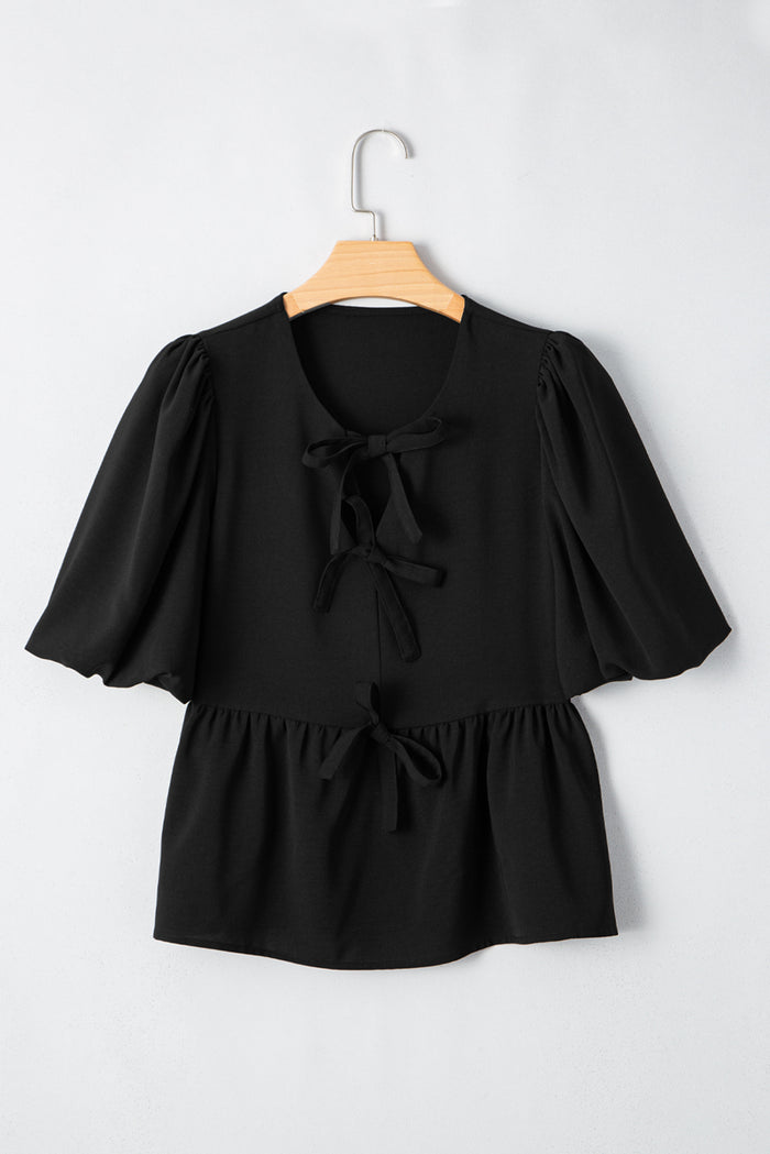 Chemise péplum noire à manches bouffantes *