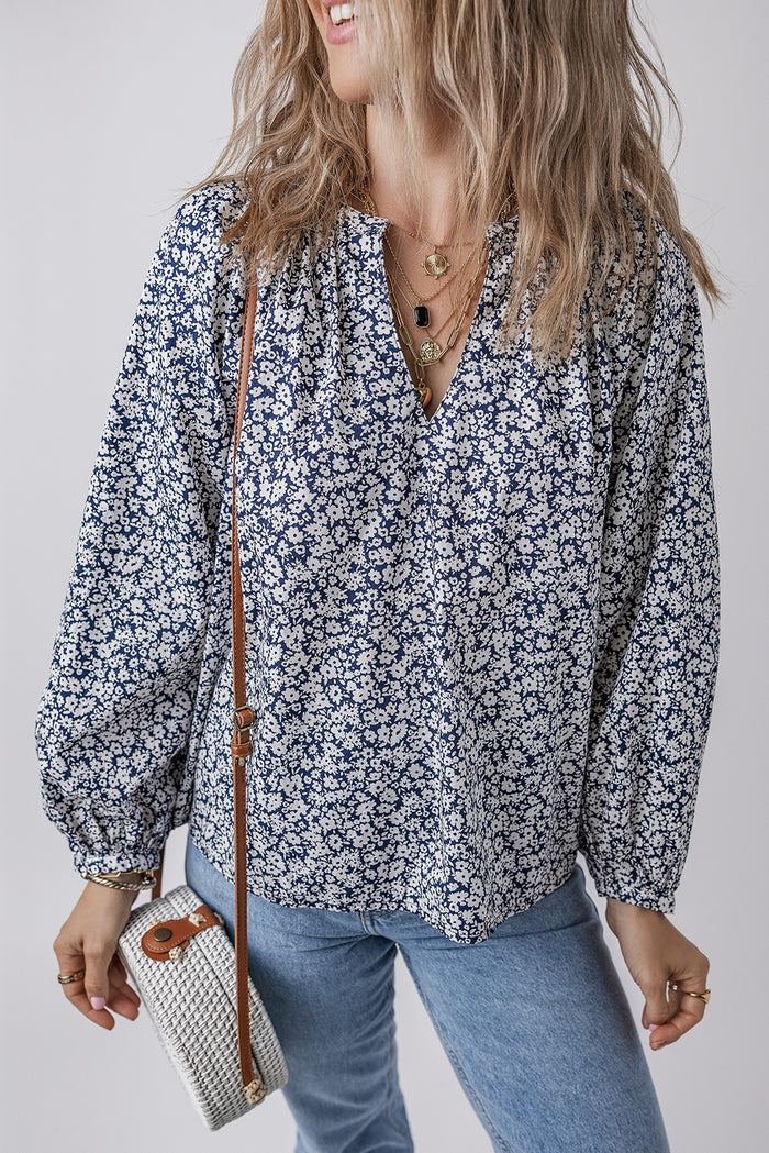 Chemisier bleu à imprimé floral et col en V cranté *-A WOMAN WE LOVE