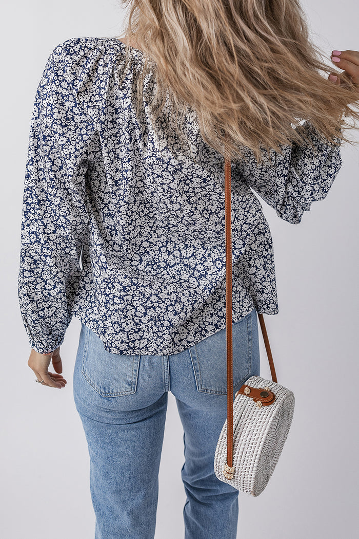 Chemisier bleu à imprimé floral et col en V cranté *-A WOMAN WE LOVE