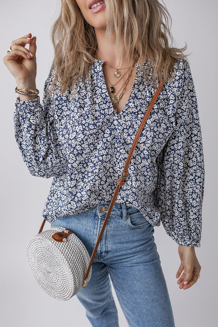 Chemisier bleu à imprimé floral et col en V cranté *-A WOMAN WE LOVE