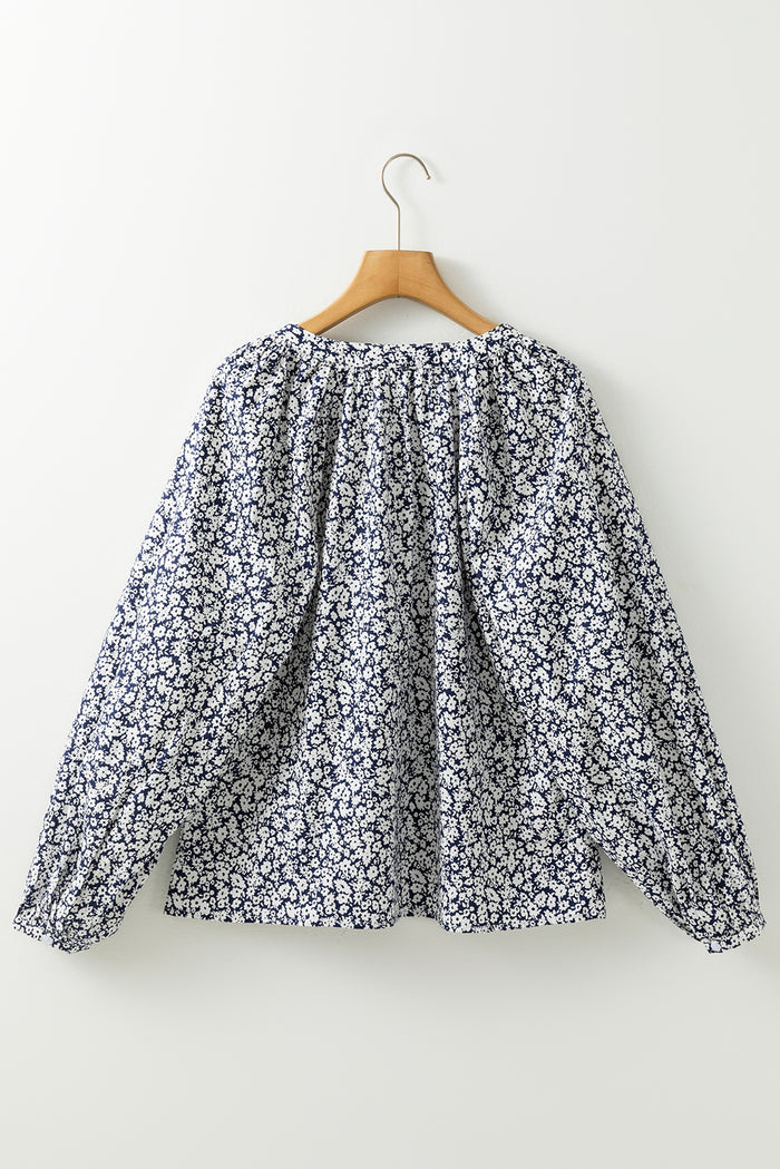 Chemisier bleu à imprimé floral et col en V cranté *-A WOMAN WE LOVE