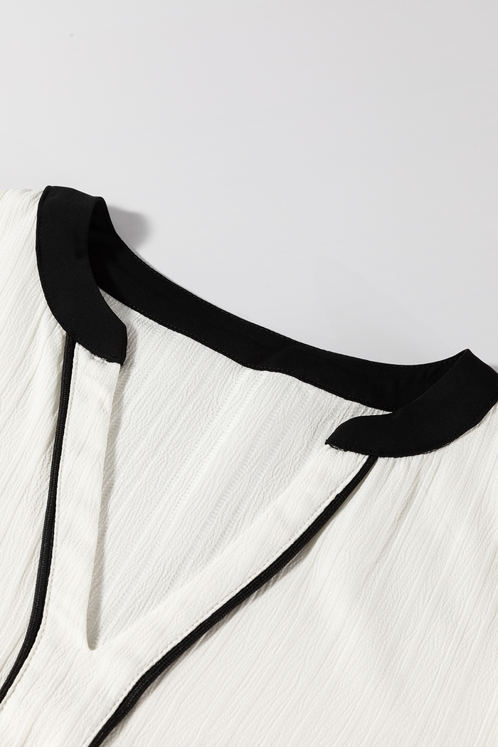 Chemisier élégant blanc texturé à col en V et color block *-A WOMAN WE LOVE