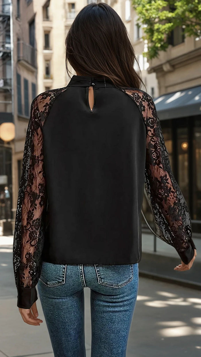 Chemisier noir à manches raglan en dentelle florale *