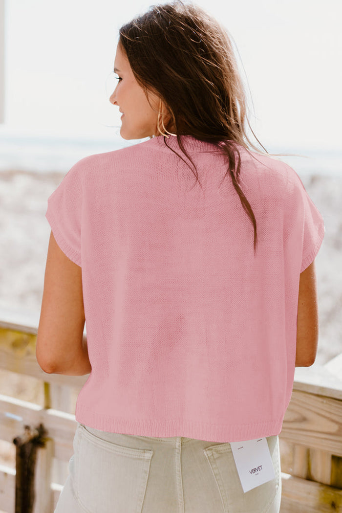 Haut pull rose à manches courtes *