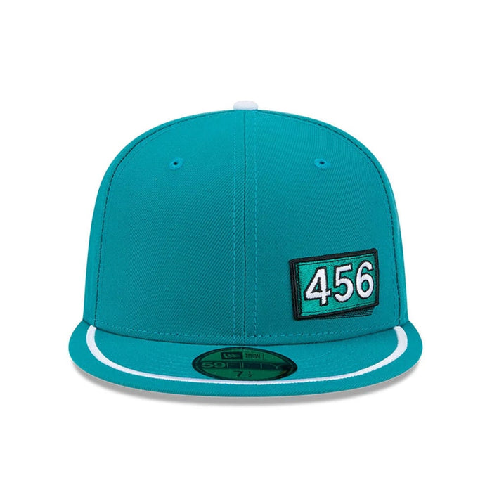 Pictured is this Netflix Squid Game 456 Patch 59FIFTY Fitted cap in green. 3