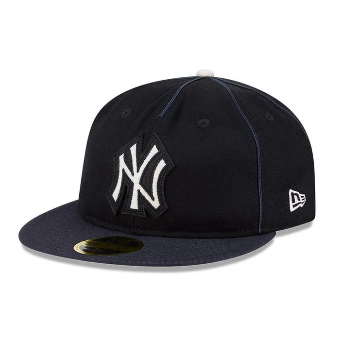 Pictured is this MLB Felt Logo New York Yankees Retro Crown 59FIFTY Fitted cap in navy. 1