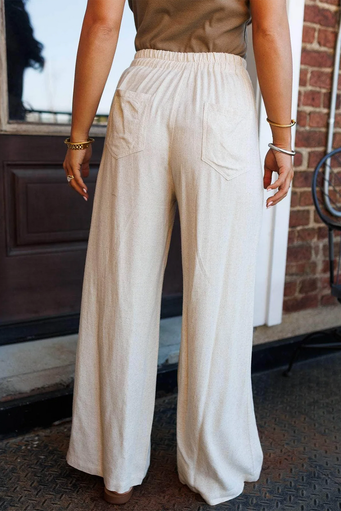 Pantalon à jambe large avec cordon de serrage couleur crème