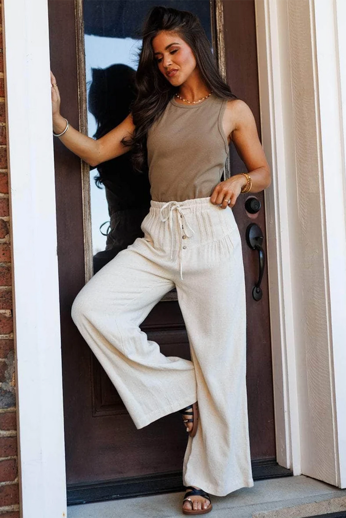 Pantalon à jambe large avec cordon de serrage couleur crème