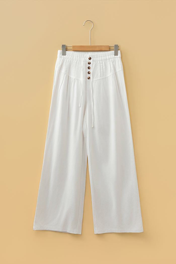 Pantalon à jambe large avec cordon de serrage couleur crème