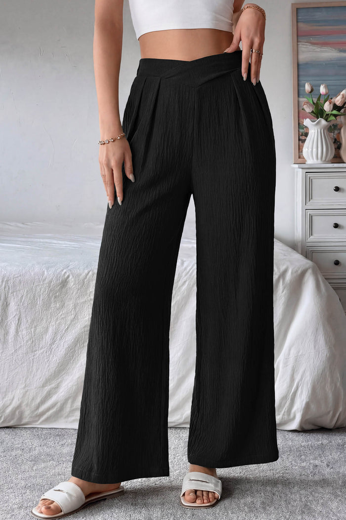 Pantalon ample texturé de couleur unie