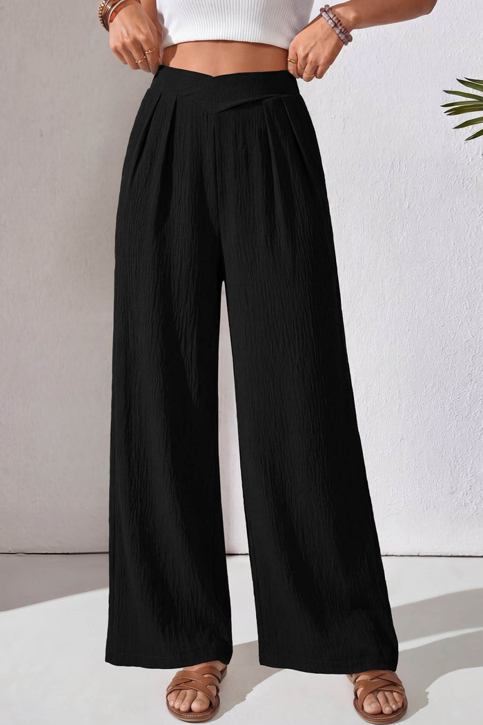 Pantalon ample texturé de couleur unie