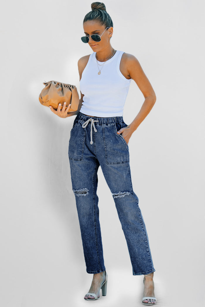 Pantalon de jogging en denim à poches rondes et vieilli bleu foncé