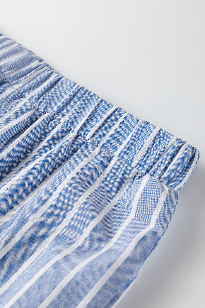 Pantalon décontracté ample à rayures et détails boutonnés bleu ciel