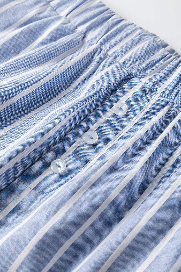 Pantalon décontracté ample à rayures et détails boutonnés bleu ciel