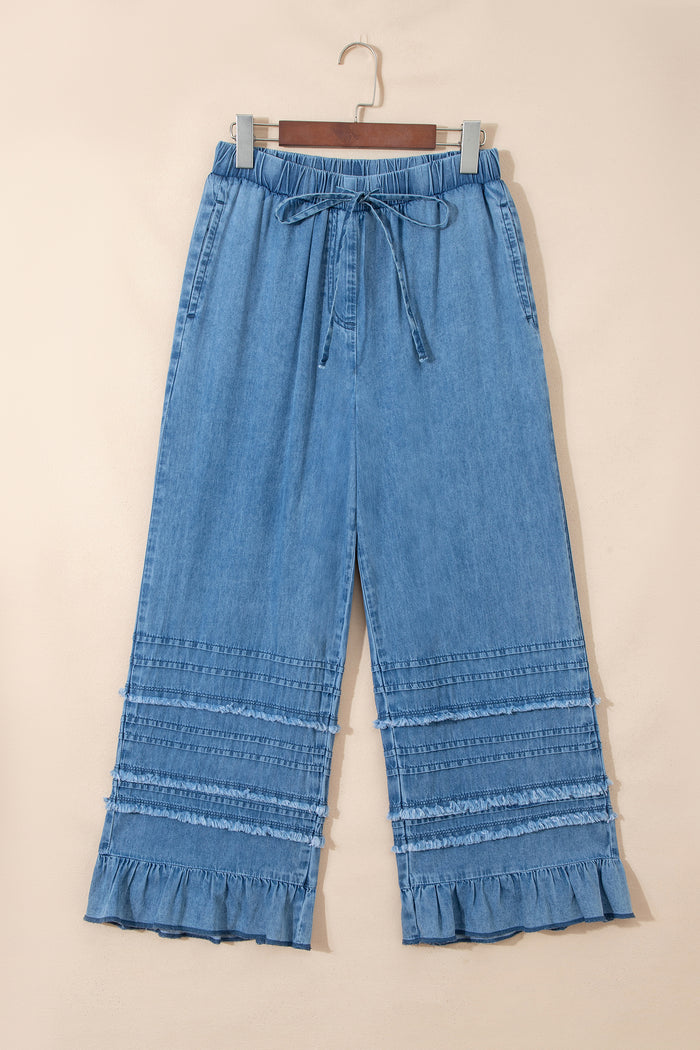 Pantalon large en chambray bleu crépuscule à ourlet volanté