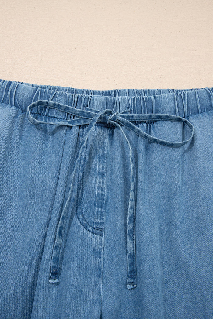 Pantalon large en chambray bleu crépuscule à ourlet volanté