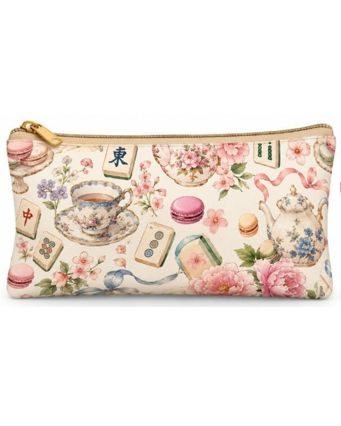Large tea-themed zip pouch with gold zipper; pastel teacups, florals, and macaron design.