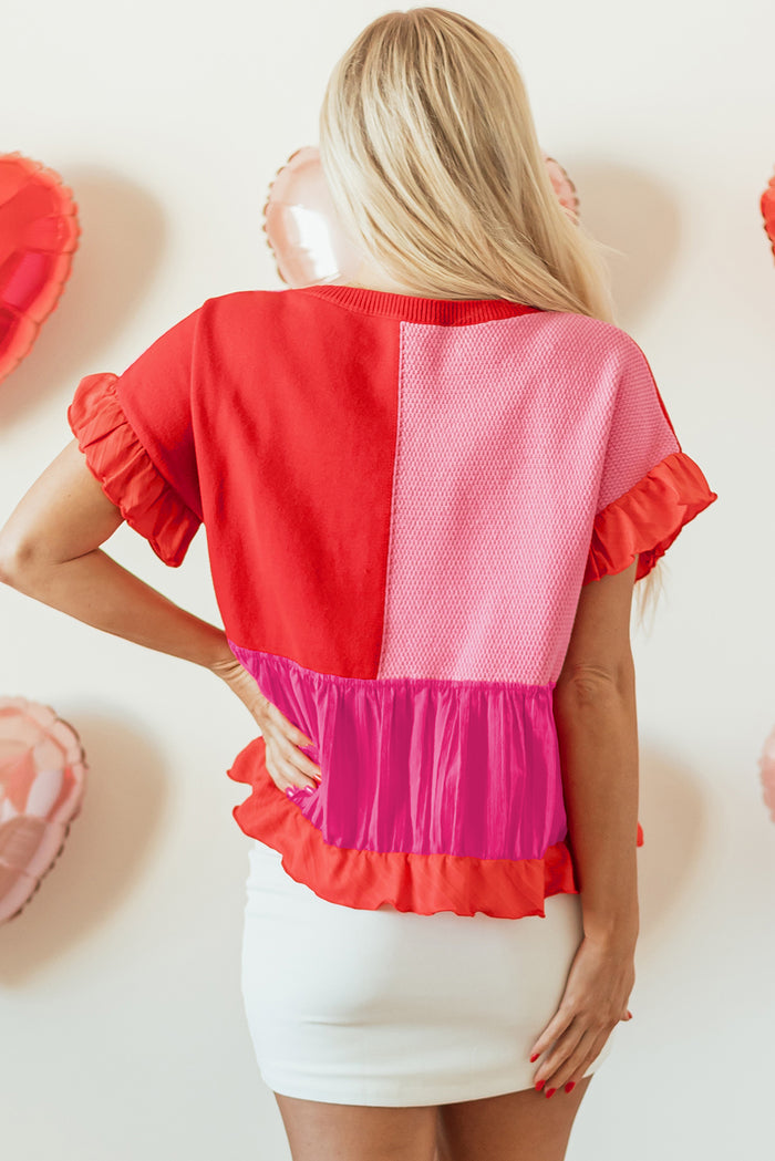 Pull ample tricoté en patchwork avec bordure à volants et mélange rouge tomate