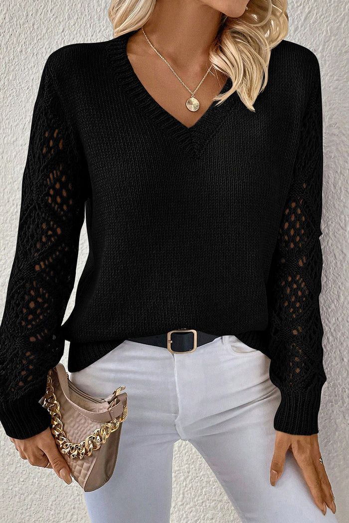 Pull patchwork noir uni à col en V et manches en tricot pointelle