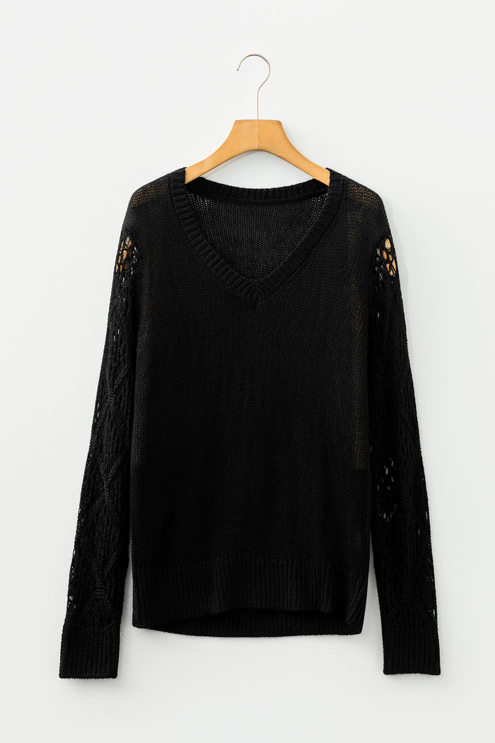 Pull patchwork noir uni à col en V et manches en tricot pointelle