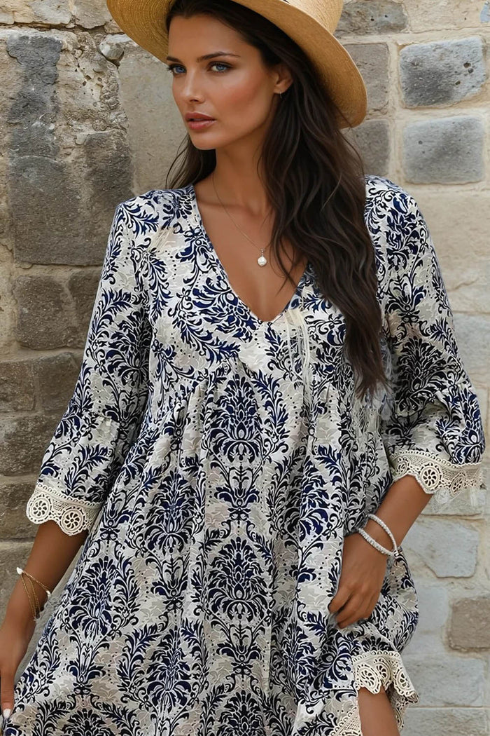 Robe ample bleu ciel à manches 3/4 et col en V *