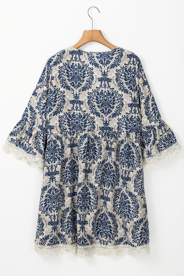 Robe ample bleu ciel à manches 3/4 et col en V *