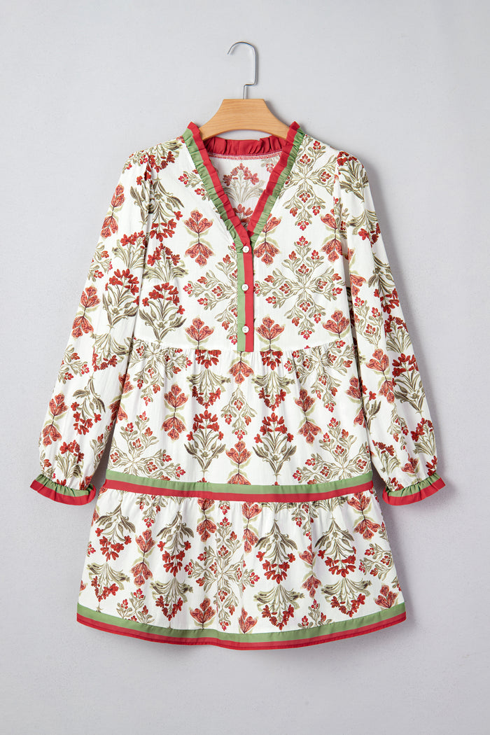 Robe évasée à manches longues et col à volants