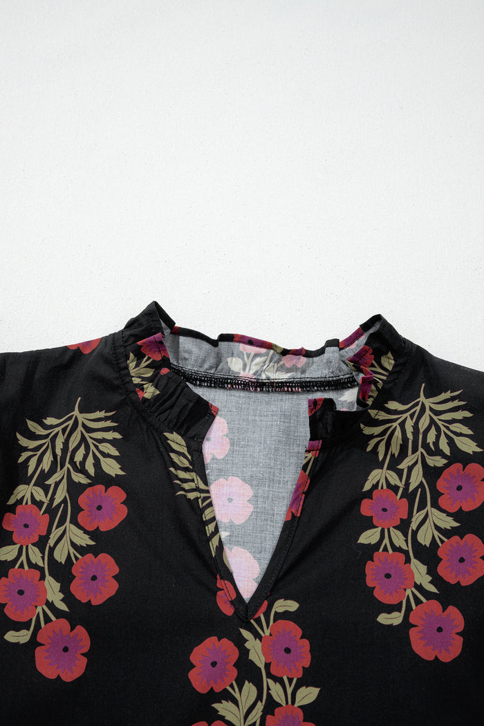 Robe longue noire à volants et manches courtes bouffantes à fleurs