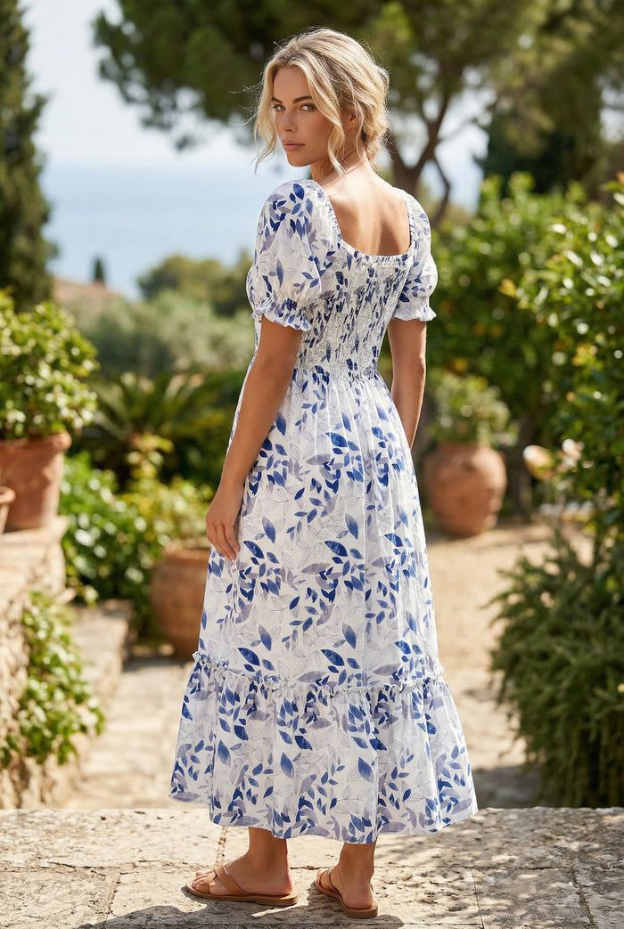 Robe mi-longue à fleurs à volants et manches courtes