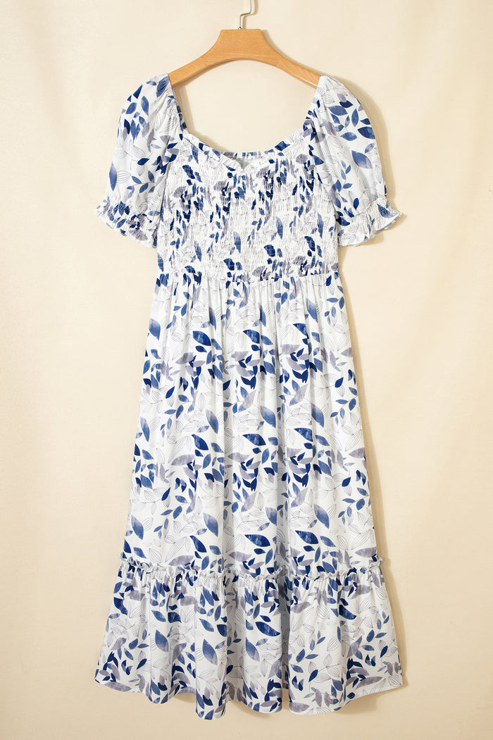 Robe mi-longue à fleurs à volants et manches courtes