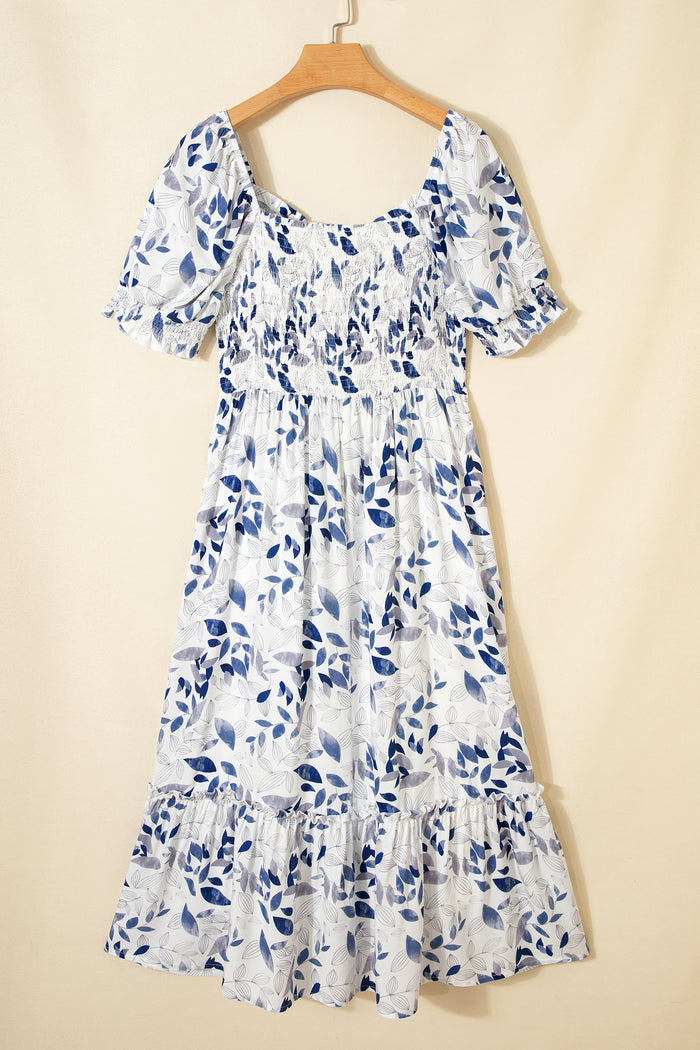 Robe mi-longue à fleurs à volants et manches courtes