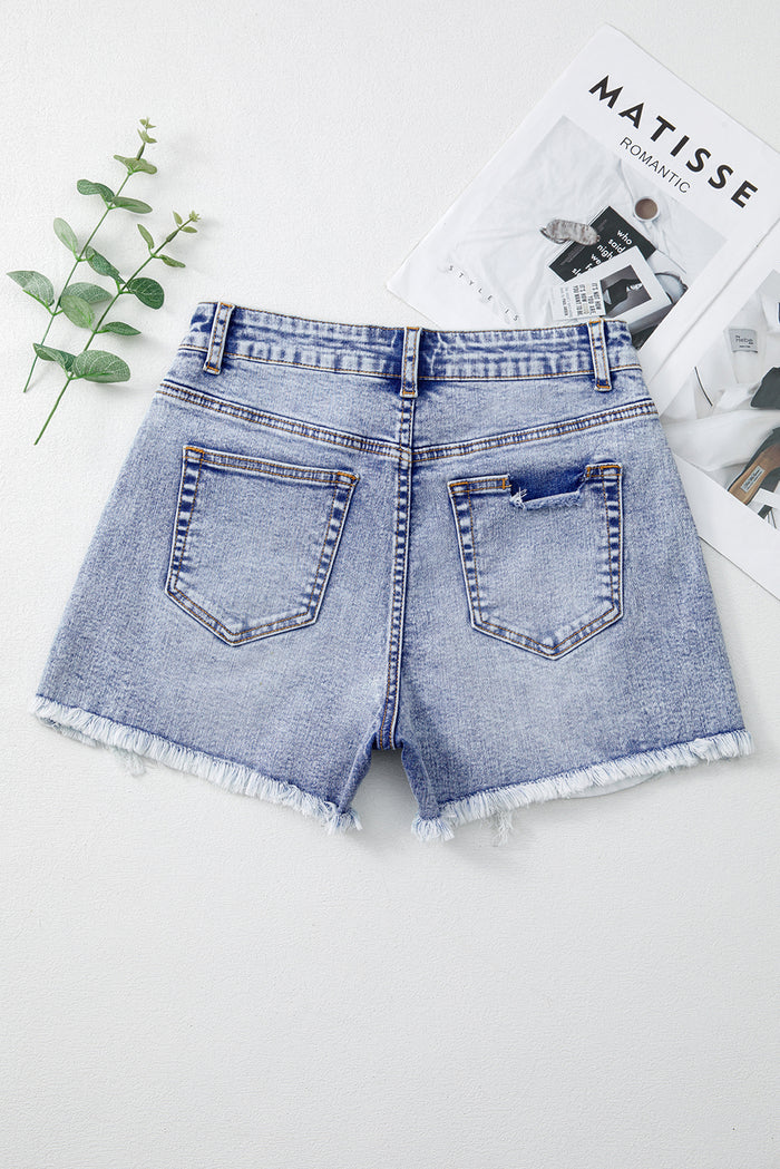 Short en jean Bleu  à poches perlées et ourlet brut