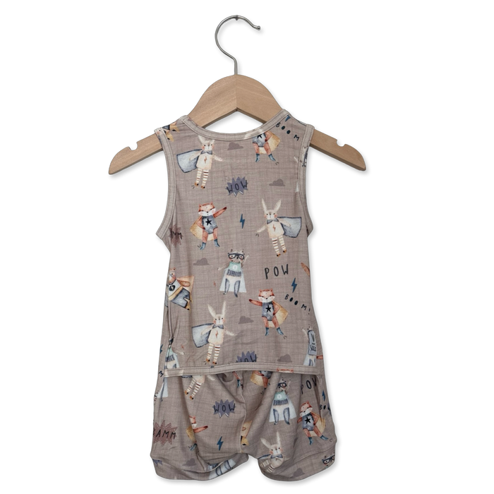 Children's sleeveless top and shorts set with animal print on a hanger against a white background