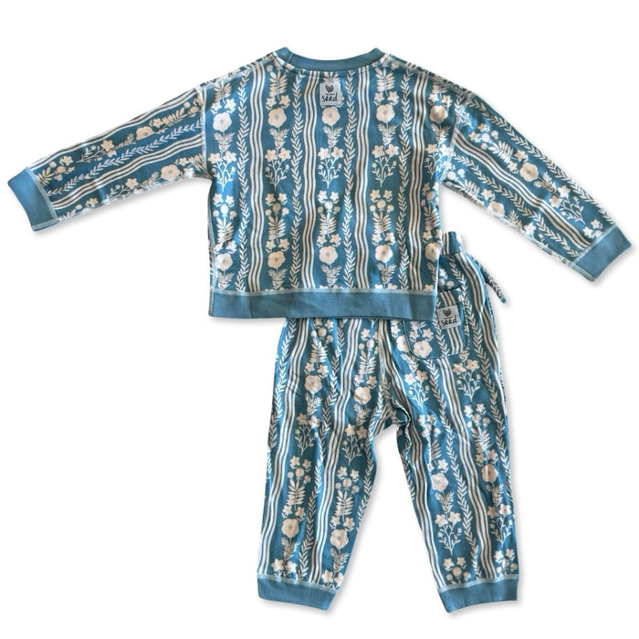 Children's pajama set with floral and striped pattern on a white background
